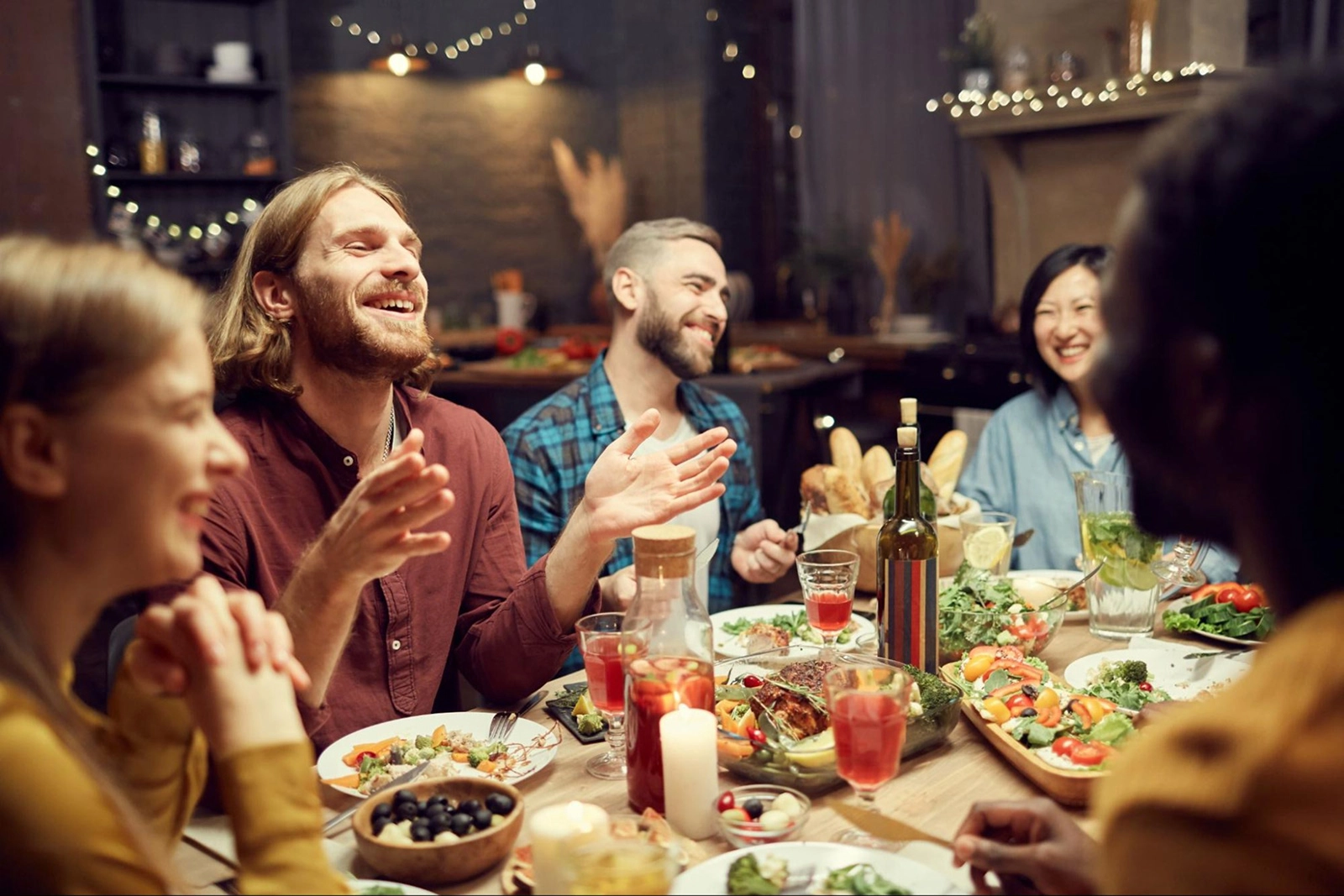 A group of people enjoy brunch in Toronto in summer.