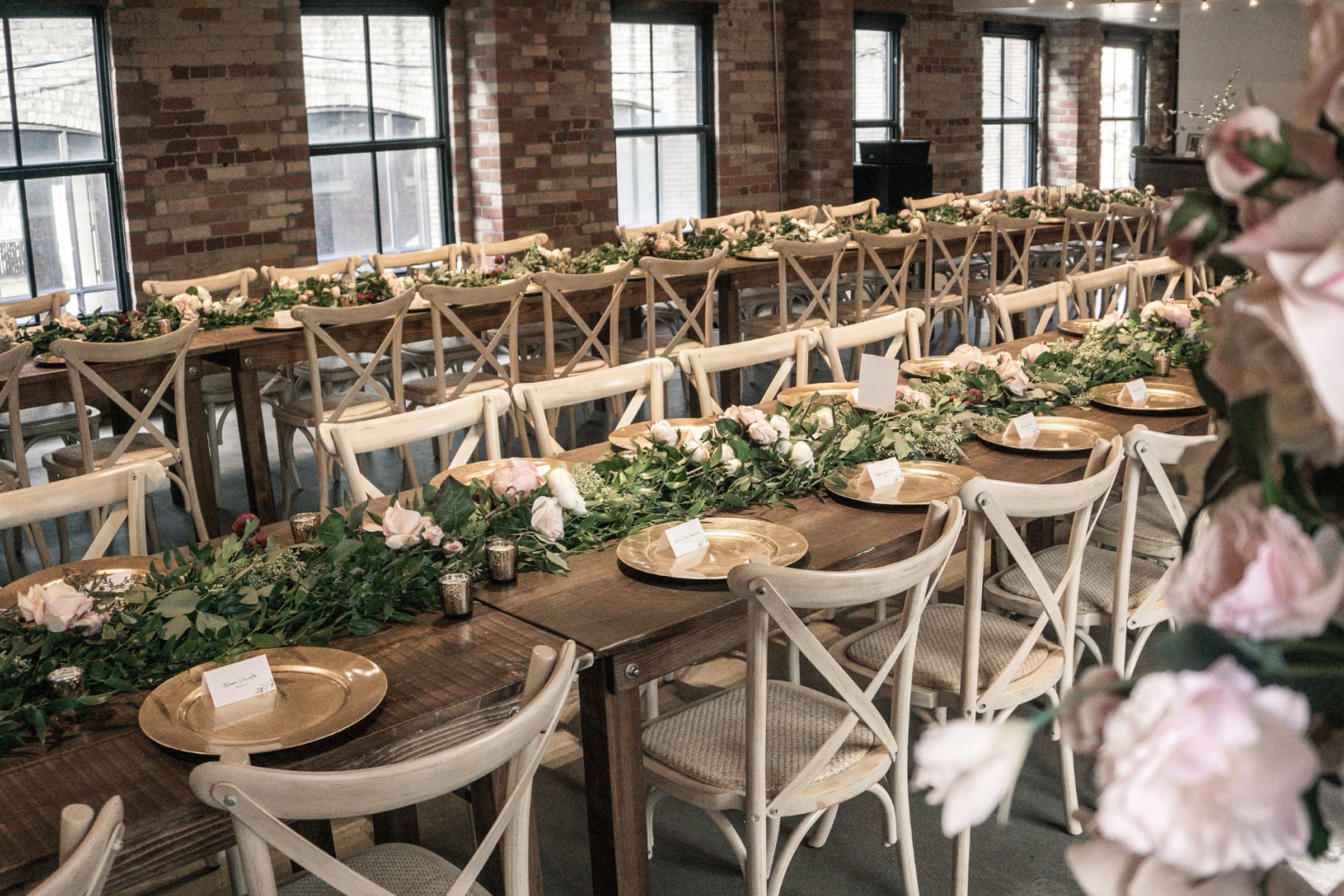 A wedding reception dinner set up for a small wedding held at The Loft on King St.