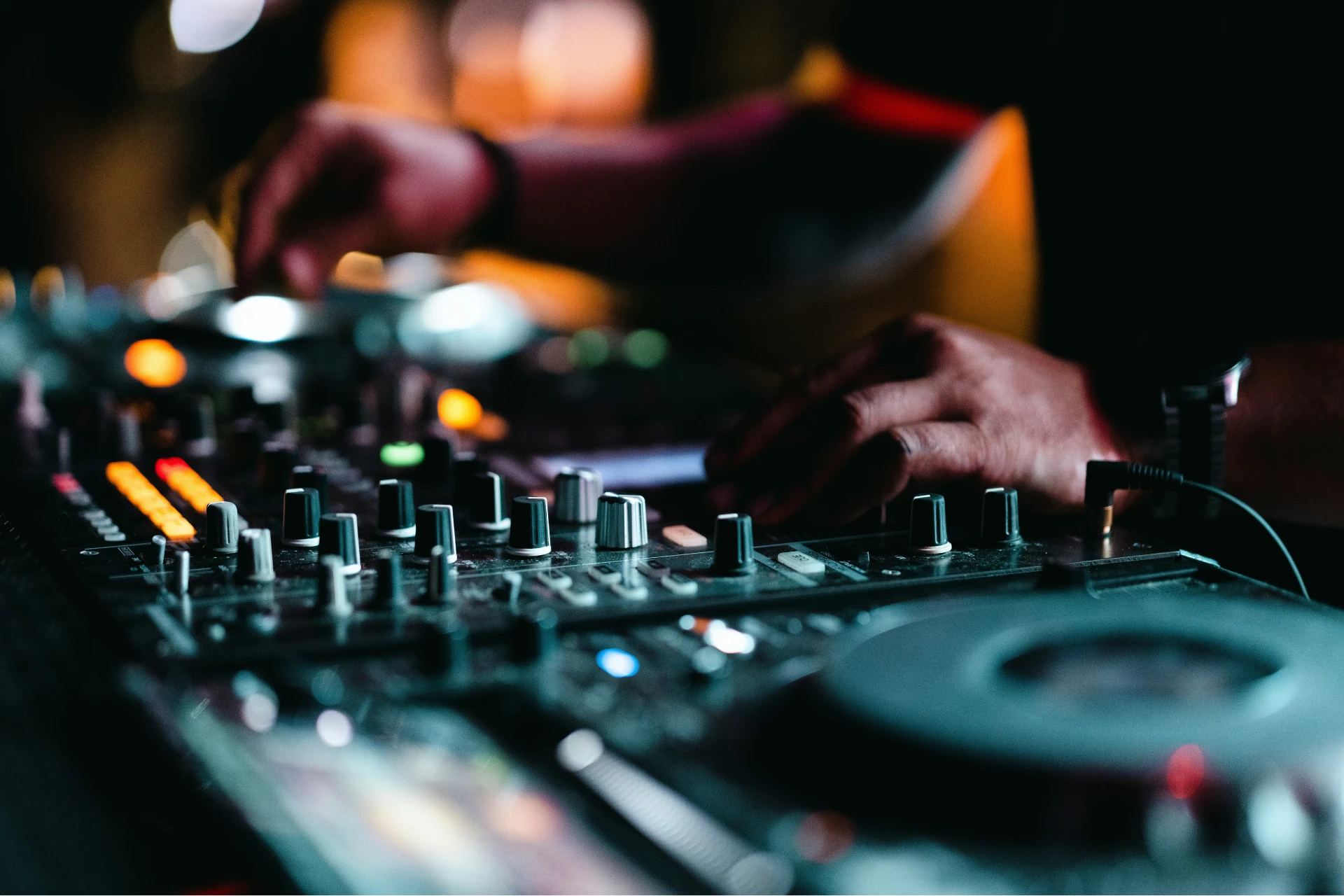 A person using a sound board