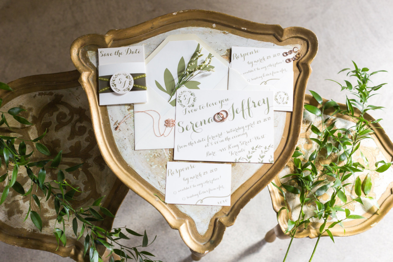 Wedding and save the date invitations on a bronze plate